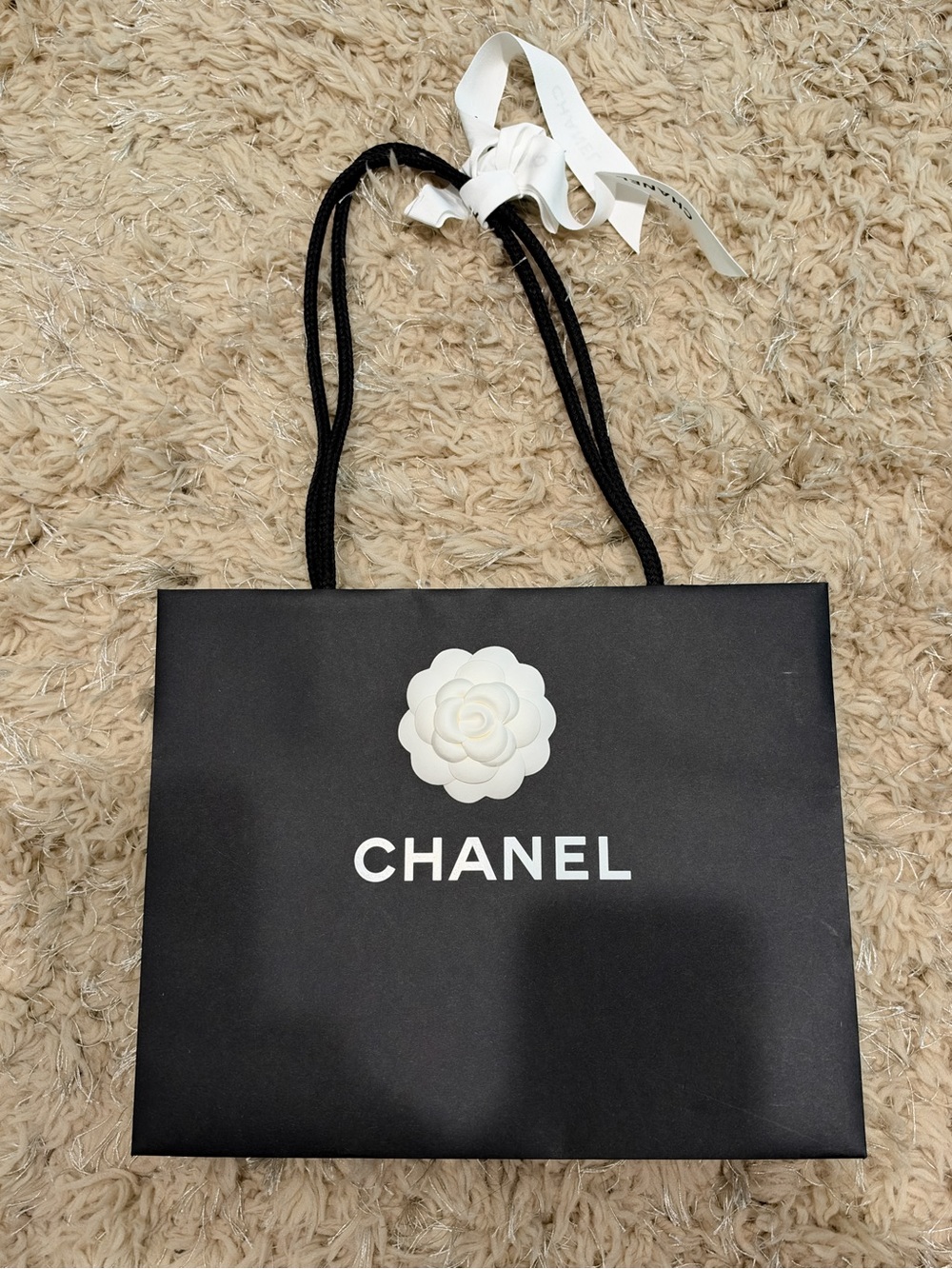 Brand New chanel shopping bag with Camellia flower and ribbon